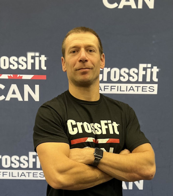 Matthieu Dubreucq headshot wearing CrossFit shirt